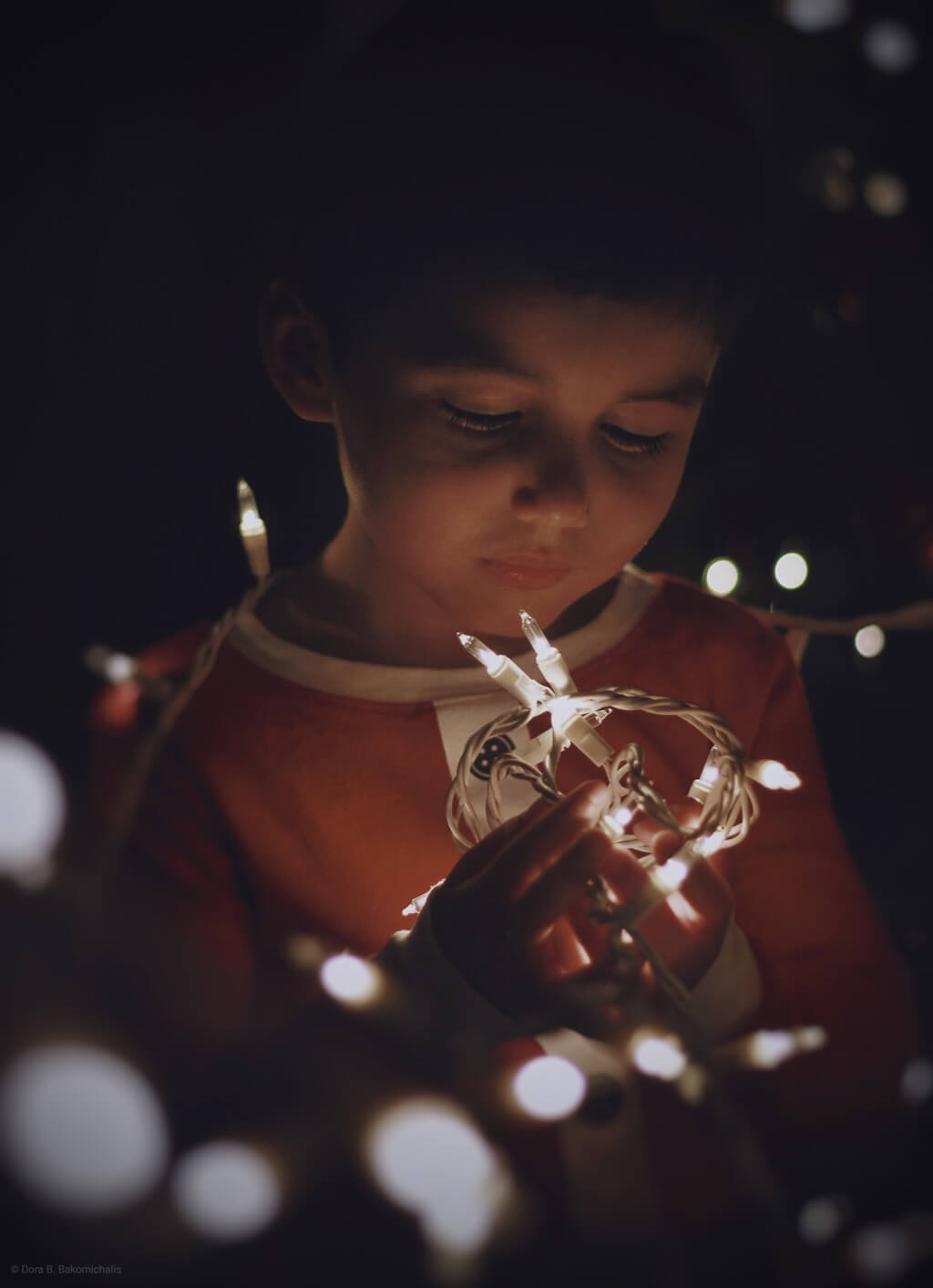 Dora B. Bakomichalis - Christmas Lights Portrait